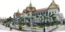 A panorama of Chakri Maha Prasat Hall and its garden from the front.

